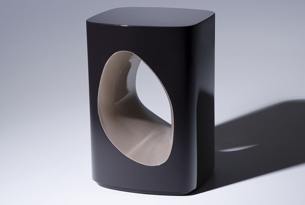 The Spectre side table showcases the interplay between postitive and negative space.